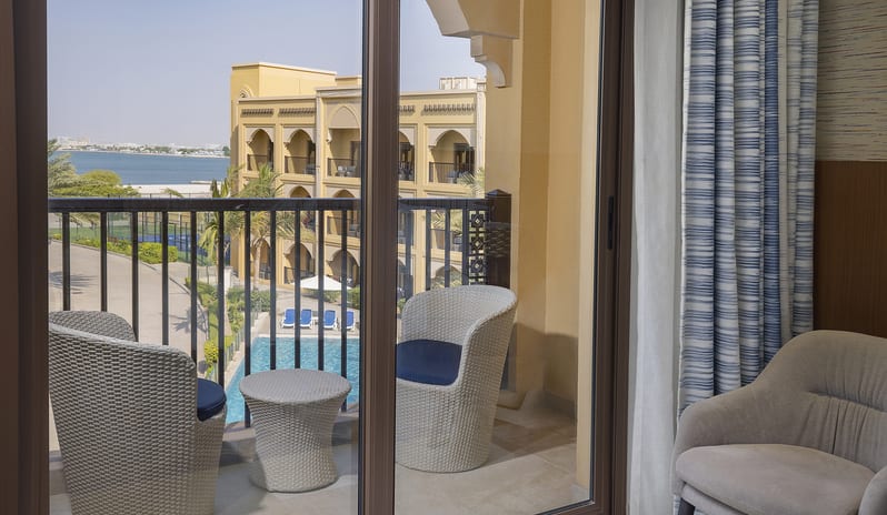 middle-east-holidays-ras-al-khaimah-doubletree-by-hilton-resort-spa-marjan-island-hotel-guest-room-with-pool-view